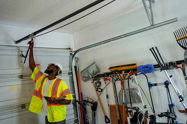 Professional Garage Door Panel Replacement technician working in Madill, OK